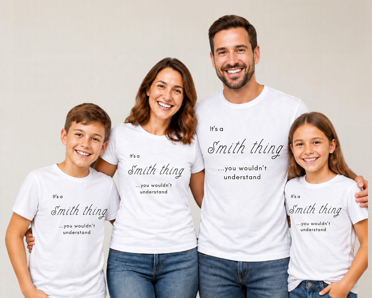 A family of four smiling in matching white T-shirts printed with It's a Smith thing, you wouldn't understand